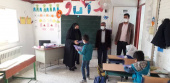 توزیع بسته های لوازم التحریر و نوشت افزار بین دانش آموزان روستای چاه نو در هفته بسیج